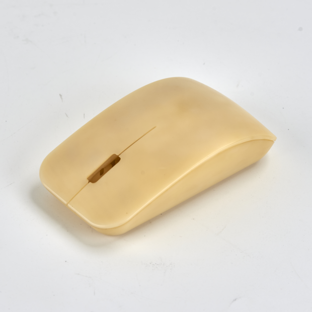 The disassembled components of an ABS mouse prototype.